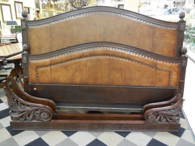 Contemporary Leather King Size Ralph Lauren Bed: A king size Ralph Lauren leather and nailhead trimmed head and foot board (including side rails). Headboard measures 83 3/8" W x 59 1/2" H. Footboard measures 83 3/8" W x 27 1/8" H. The side rails mea