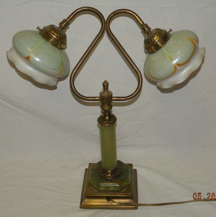 Antique Art Glass Favrile / Aurene Style Lamp: Antique double arm green onyx and art glass shade lamp. Exterior of shades have a scalloped stripe and interior has a Louis Comfort Tiffany Favrile or Stuben Aurene appearance but is unmarked. Loetz i