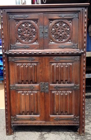 Antique English Tudor Style Dining Room Cabinet: Antique English Tudor style mahogany dining room cabinet. Having an interior fitted for cutlery and linens.