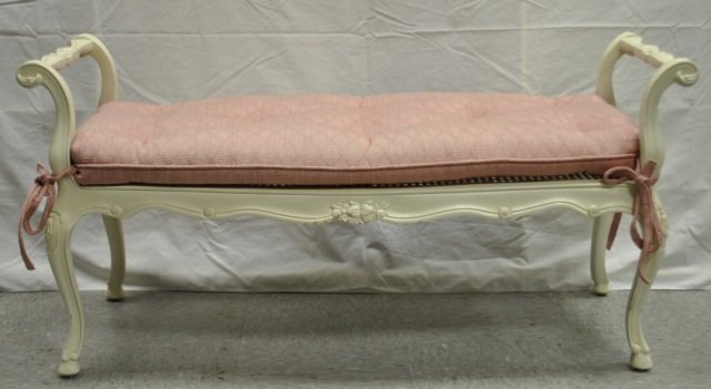 Julia Gray White Painted Bench Pink Cushion: Julia Gray white painted bench with pink cotton cushion. Cushion has button tufting and attaches with ties. Top of bench is cane. 42" x 1" d x 21" H. Seat height is 16". In very good condition.