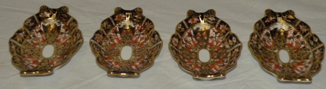 Set of Antique Royal Crown Derby Imari Dishes: Set of four antique Royal Crown Derby Imari dishes. Each with small handles at sides. Nice condition for age. Each measures 5.25 by 3.25 inches.