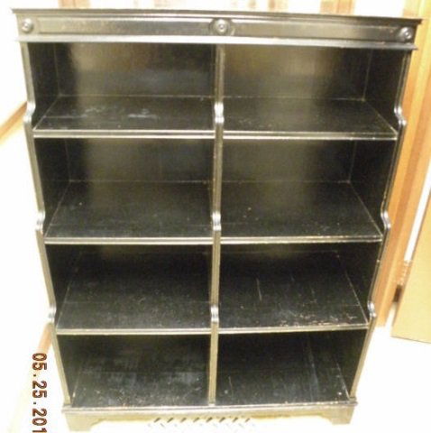 Vintage Ebony Painted Wood Open Shelf Bookcase: Vintage ebony painted wood open shelf bookcase, staggered shelf depths, rosette and striped details. Measures 52 inches in height, 36 inches in width and 13 inches in depth.