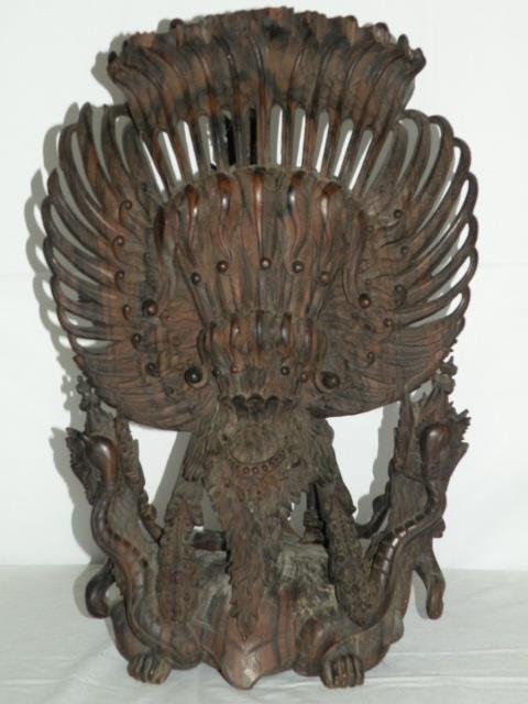 Balinese Carved Wood Garuda Sculpture: Balinese wood Garuda sculpture. Very intricately carved. 13" W x 9" D x 20" H. In very good condition. .