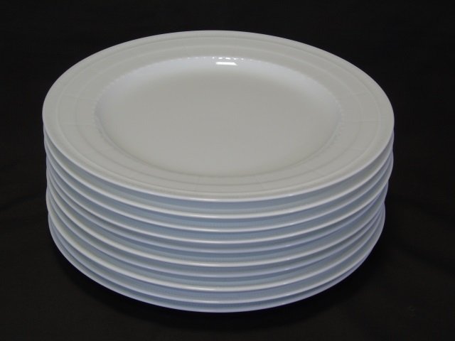 Set of 10 Bernardaud Limoges Louvre Plates: Set of ten Bernardaud Limoges blanc de chine plates. "Louvre" pattern. 12" diameter. In excellent condition.