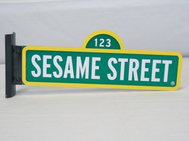 40th Anniversary Sesame Street Sign: 40th Anniversary Sesame Street sign used on the television show. 16" W x 5 1/2" H. Excellent condition.