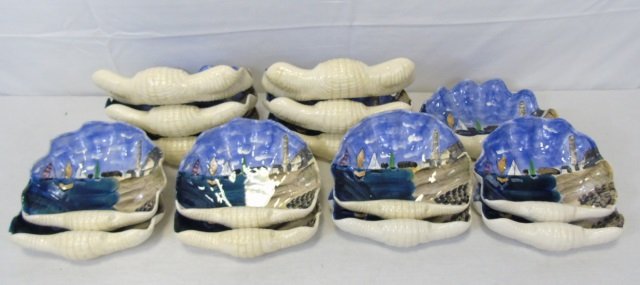 Set of 15 Painted Shell Bowls w/ Boat Scene: Set of 15 painted shell bowls with boat scene and lighthouse. 7 larger: 11" W x 9" D x 2 1/2" H. 8 smaller: 9 1/2" W x 7 1/2" D x 2 1/2" H. Very good condition.