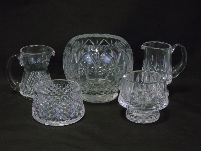 Lot of 5 Waterford Crystal Items Creamers Bowl: Lot of 5 Waterford crystal items. (2) creamers, (1) wine coaster, 3 3/4" diameter opening, (1) bowl / vase 5 1/2" diameter x 5 1/2" H. (1) nut bowl, 4" dia. x 3 1/2" H. In excellent condition.