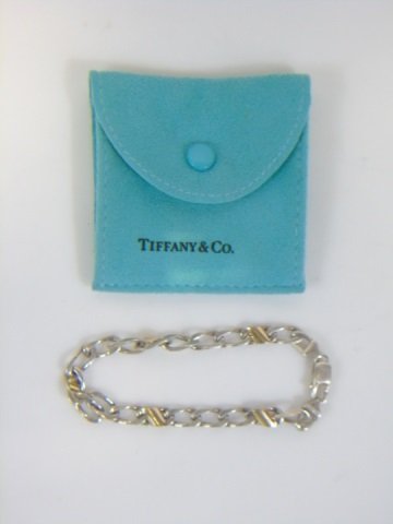 Vintage Tiffany & Co. Silver & Gold Chain Link Bracelet: Vintage Tiffany & Co. Silver & Gold Chain Link Bracelet. Hallmarked for silver and Tiffany. Original dust cover. Measures 7.5 inches in length.