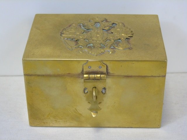 Antique Gilt Metal Russian WWI Box: Antique Gilt Metal Russian WWI Box. Imperial double headed eagle on top. Measures 2.25 inches in height, 4 inches in width, and 2.75 inches in depth.