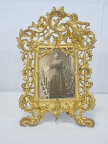 Antique Gilt Ormolu Metal Picture Frame: Antique Gilt Metal Picture Frame. Measures 12 by 8 inches.