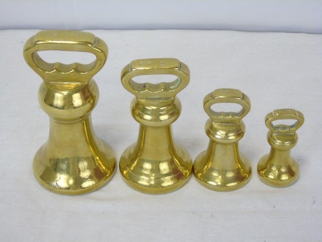 Set 4 Vintage Antique Brass Bell Weights Barbells: Set of 4 vintage antique brass bell weights. 7, 4, 2 and 1 pound weights. Made by Burges Hall. Largest is 3 1/2" diameter x 7" H. Very good condition.