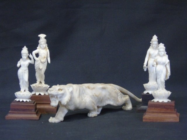 Lot of 5 Bone Indian Goddess Statues & Tiger: Lot of five bone Indian statuettes. Four dancing statuettes and one panther. Panther is 8 1/2" long. Statuettes are approx. 4 1/2 H. Good condition.