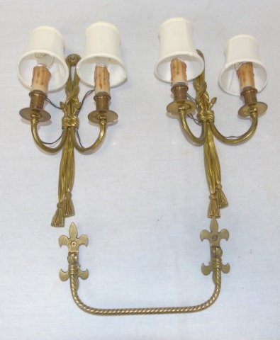 Pair of Vintage Antique Brass Sconces Towel Bar: Pair of vintage antique brass sconces with tassel detail. Two arms. Beige silk shades. Also included antique brass hand towel bar with fleur de lis detail. Great for a powder room. Sconces: 7" W x 14"