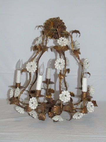 Antique Vintage Brass Chandelier Burnished Gold: Antique vintage brass chandelier with a burnished gold finish. Applied white porcelain flowers. 5 candelabra lights. 20" diameter x 27" H. Good antique condition.