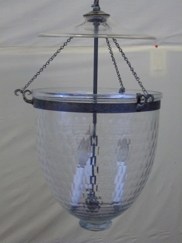 Antique Glass Globe Lantern Light Fixture: Antique clear glass globe lantern light fixture. Etched bronze trim detail. 3 interior candelabra lights. 13" diameter x 54" high. May be height adjusted.