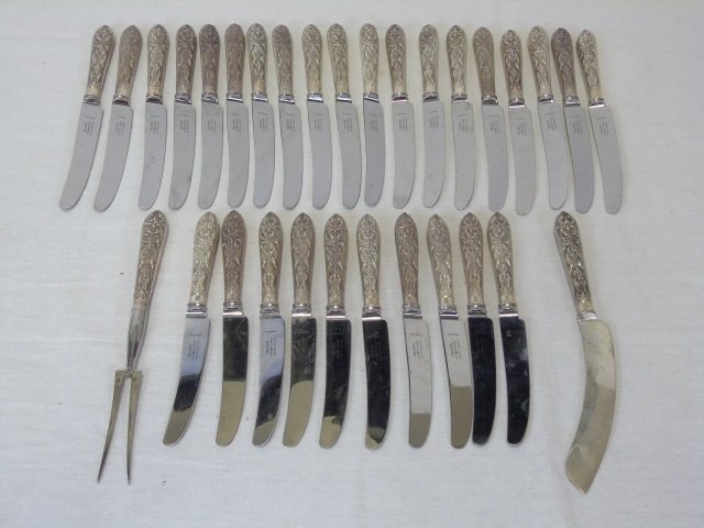 Lot 29 Taylor's Eye Witness Sterling Silver Knives: Lot of 29 Taylor's Eye Witness Sheffield, England sterling silver knives plus a curved blade serving knife and meat fork. Stainless blades, silver handles. Good condition. Needs polishing.