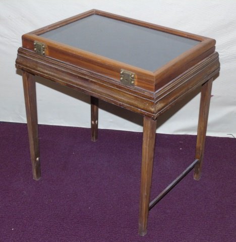 Vintage A.J. Russell Knives Display Table: Vintage A.J. Russell Knives display end table. Wood base, glass top. 19" W x 14" D x 20" H. Good condition.