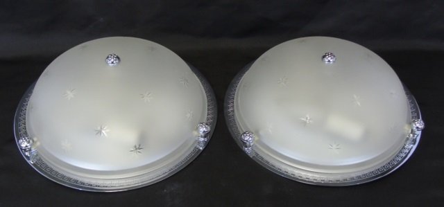 Pair of Vaughan Flush Mount Ceiling Light Fixture: Pair of Vaughan (in the D & D building) flush mount ceiling light fixture. Frosted glass with etched stars. Chrome back plate with Greek key motif. 11" diameter x 3" H. Good condition.