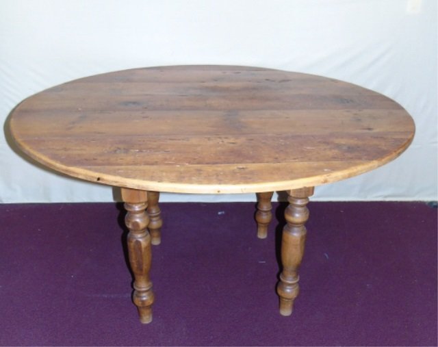 Antique Plank Top Knotty Pine Farm Dining Table: Plank top knotty pine dining room table. Four balustrade turned legs. Rustic finish. 53" diameter x 31". Good antique condition.
