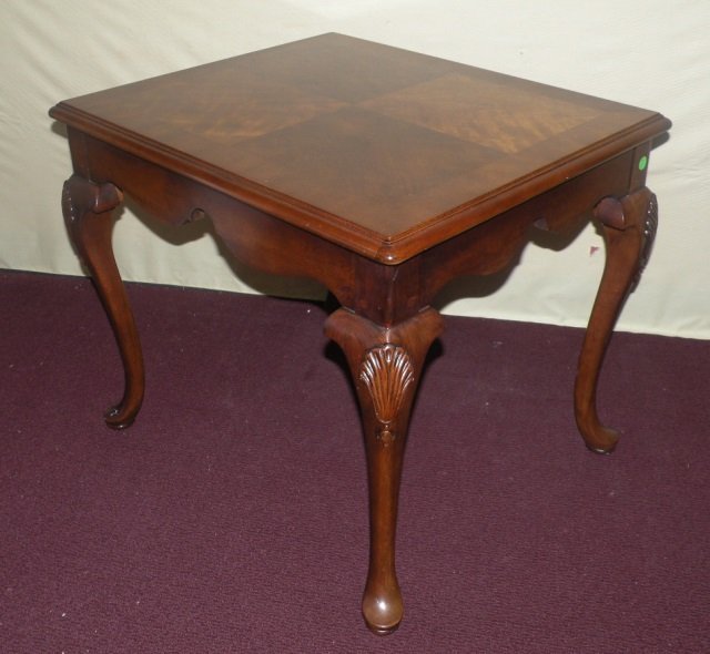 Mahogany Shaped Apron Cabriole Leg Side Table: Mahogany shaped apron cabriole leg side table. Shell carved detail. 27" W x 23" D x 23 1/2" H. Good condition.