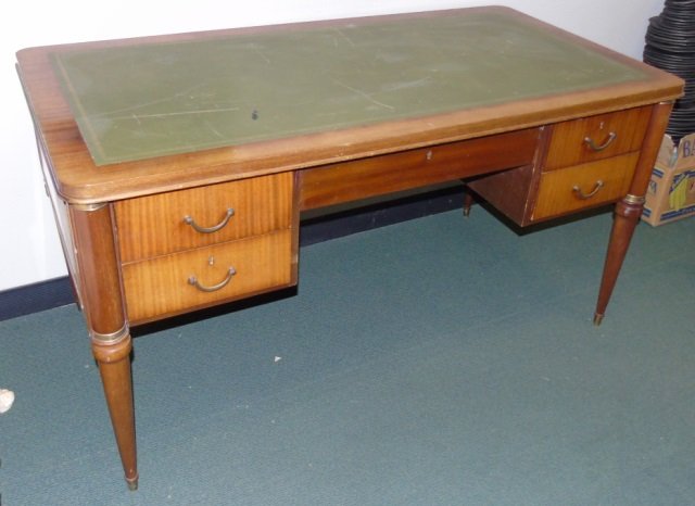 Antique Oak Desk w/ Green Leather Top: Antique oak desk with geen leather top insert. Gold tooled detail. Five drawers. Antique brass pulls. 58" W x 29 1/2" D x 30 1/2" H. Needs restoration.