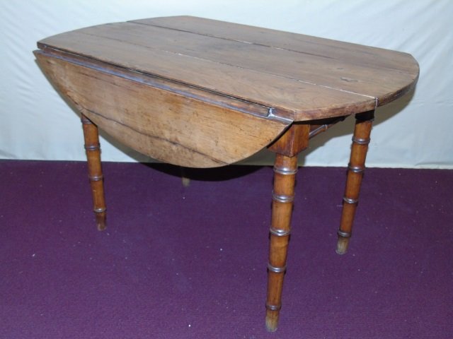 Antique 19th C. English Victorian Bamboo Table: Antique 19th C. English Victorian Bamboo Table. Drop leaf breakfast or dining table. Can be used as hallway console. Unique tapered bamboo motif legs. Measures 29 inches in height, 42 inches in width,