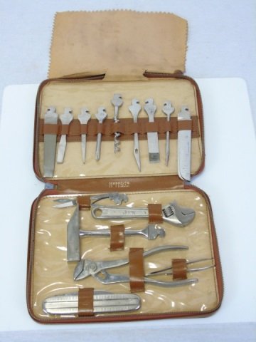 Vintage Hoffritz Tool Set File Knife Leather Case: Vintage Hoffritz Tool Set with files, knife and files with zip leather case. Set includes 15 stainless steel items. Case measures: 5 1/2" W x 7 1/2" H. Good vintage condition. Case shows a bit of wear