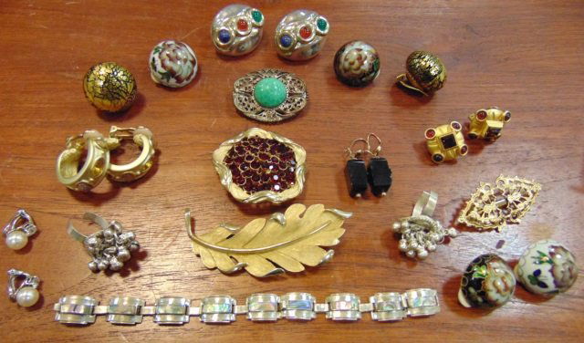 Large Lot of Vintage Costume Jewelry: Large Lot of Vintage Costume Jewelry. Sterling silver, Trifari, etc. Earrings and brooches / pins.