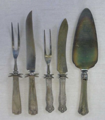 Assorted Sterling Silver Serving Utensils: Assorted Sterling Silver Serving Utensils. Each with sterling silver handle. Longest measures 10 inches in length.