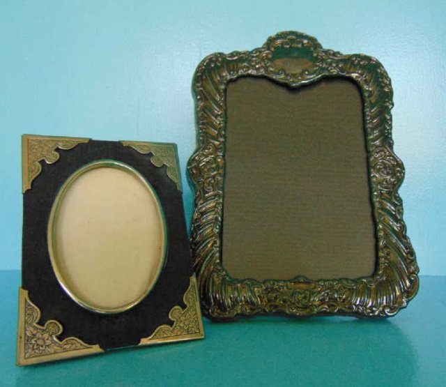 Two Sterling Silver Picture Frames: Two Sterling Silver Picture Frames. Sterling and silver plate. Largest measures 8 by 5.5 inches. From the Greenwich, Connecticut home of interior decorator Catherine Cleare.