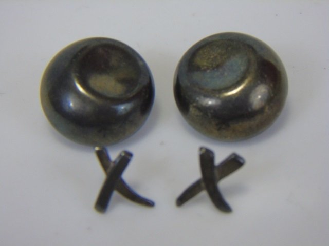 2 Pairs Tiffany & Co. Peretti Earrings Sterling: Two pair of Tiffany & Company Elsa Peretti sterling silver earrings. "X" kiss studs. Clip on "button" style earrings. Total weight .58 ounces. Includes signature Tiffany pouch. Good condition.