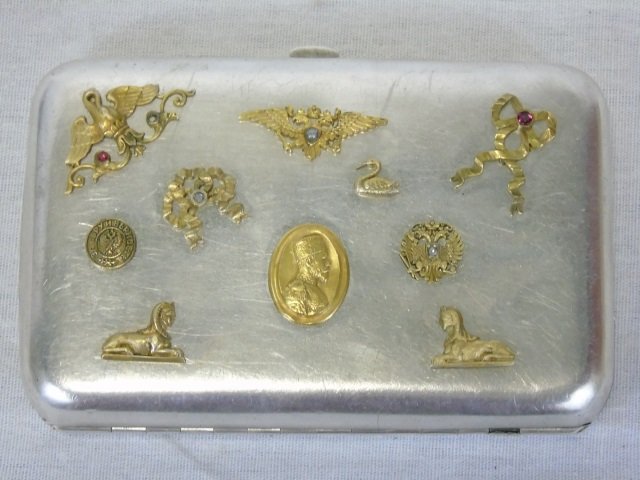 Antique Imperial Russian Silver Cigarette Case: Antique Imperial Russian Silver Cigarette Case. Having vermeil mounts on front of case showing sphinxes, swans, bows, Nicholas II, Imperial Eagle, etc. Stones test as diamonds and rubies. Interior wit