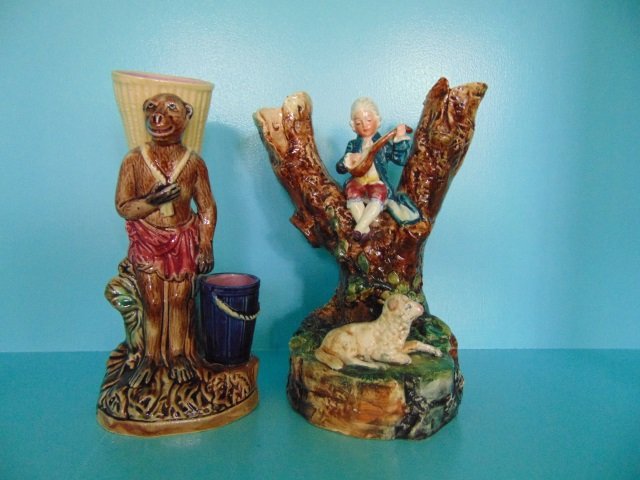 Two Antique Majolica Figural Vases: Two Antique Majolica Figural Vases. Rococo figure and monkey. Each measures approximately 8.5 inches in height. From the Greenwich, Connecticut home of interior decorator Catherine Cleare.