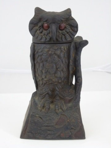 Antique Toy Cast Owl Mechanical Bank: Antique Toy Cast Owl Mechanical Bank. Turns head. Measures 8 inches in height.