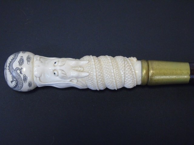 Antique Walking Stick Cane w/ Bone Serpent Head: Antique walking stick cane with carved bone serpent head handle. 36" long.
