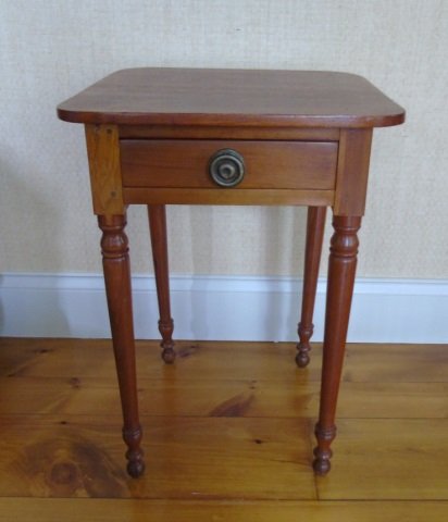 Antique American Country Single Drawer End Table: Antique American Country Single Drawer End Table or Nightstand. Clean lines, one drawer, original hardware. Measures 28 inches in height, 20 inches in width, 19.5 inches in depth. From a Jeffrey Bilhu