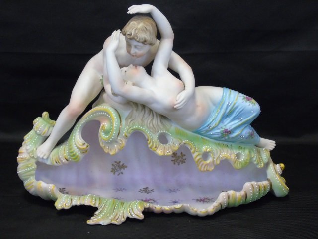 Large Bisque Porcelain Figural Sculpture Statue: Large Bisque Porcelain Figural Sculpture Statue. Hand painted bisque porcelain statue. Measures 10 inches in height, 13 inches in width, 5 inches in depth.