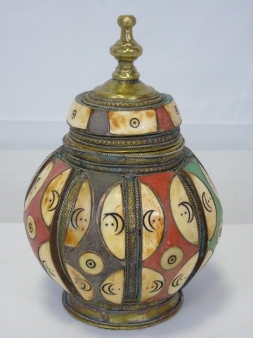Decorative Moroccan Jar w/ Hinged lid: Decorative Moroccan jar with hinged lid. Brass with painted detail on wood and bone. 6" diameter x 9 1/2" H.