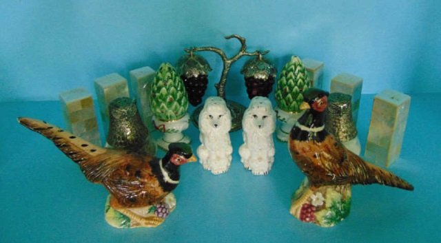 Collection of Antique to New Salt Pepper Shakers: Collection of Antique to New Salt Pepper Shakers. Shell, porcelain, silver plate, etc. Tallest approximately 5 inches. From the Greenwich, Connecticut home of interior decorator Catherine Cleare.