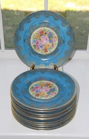 Lot of 12 Floral Porcelain Rosenthal Dinner Plates: Lot of 12 floral porcelain Rosenthal dinner plates. Bavarian. Lovely blue border. 14" diameter. From the Greenwich, Connecticut home of interior decorator Catherine Cleare.