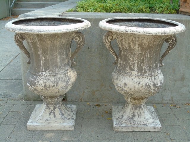 Pair of Faux Limestone White / Gray Urn Planters: Pair of composite white / gray urn planters. They resemble weathered limestone. 20" diameter x 26" H.