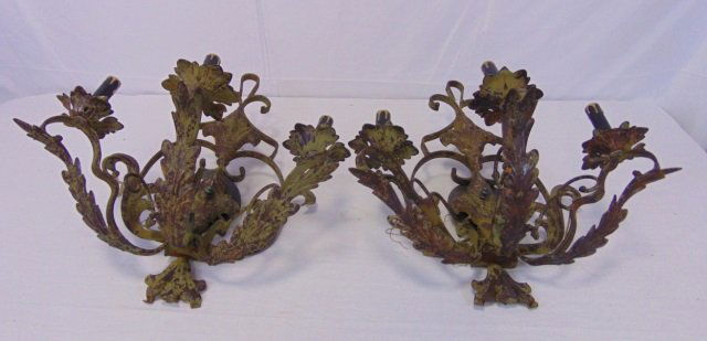 Pair of Vintage Iron Leaf Sconces Green Patina: Pair of vintage iron sconces leaf adornment. 3 lights each. Nice green patina. 19" W x 22" H x 13 1/2" D.