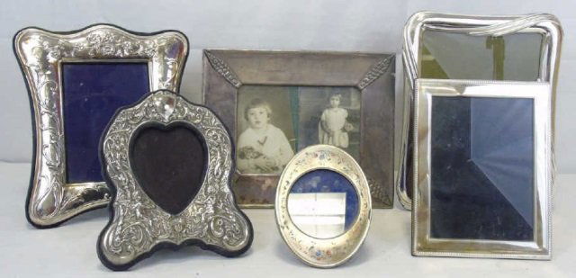 Vintage Silver Plate Picture Frames: Vintage Silver Plate Picture Frames. Largest measures 11" x 9".