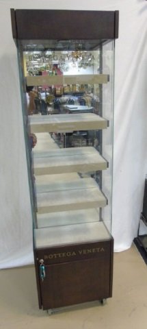 Bottega Veneta Eye Glass Store Display: Bottega Veneta eye glasses store display. 10 shelves total. Storage below. 19 1/2" x 19 1/2" x 71" H