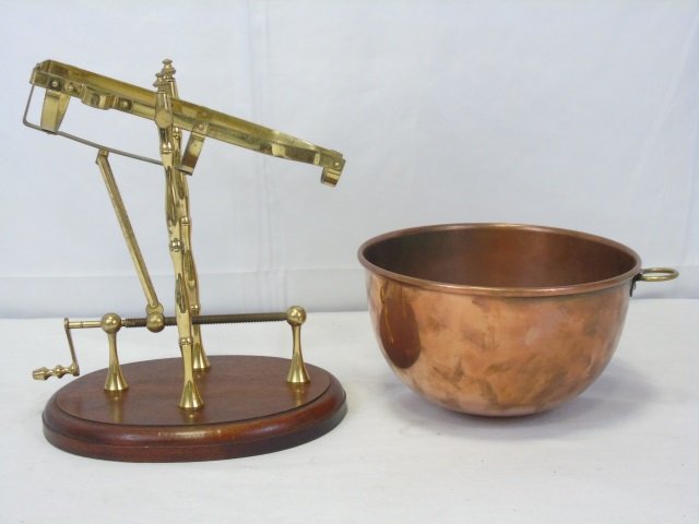 Vintage Brass Wine Cradle and Server+ Copper Bowl: Vintage brass wine cradle and server with mahogany wood base. Crank wheel pour mechanism. 11 1/2" W x 8 3/4" D x 13" H. Included is a vintage copper bowl.10"diameter x 6" H.