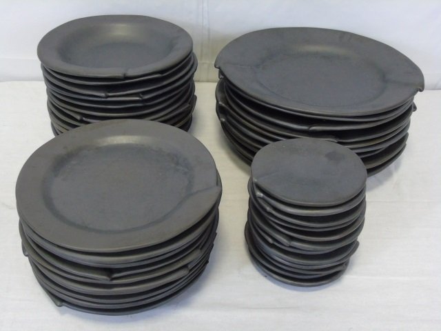 Cyclamen Collection Pottery Plates Bowls: Cyclamen Collection pottery designed by Julie Sanders. (10) 12" diameter dinner plates, (11) 9" salad plates, (12) 9" bowls, (12) 5" saucers.
