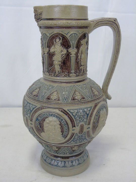 Antique German Majolica Tankard w/ Portraits: Antique German Majolica Tankard w/ Portraits. Having portraits of Jean-Baptiste Poquelin, known by his stage name Molire, Antonius es Grand, Thomas Corneille and Voltaire in cartouches around the base