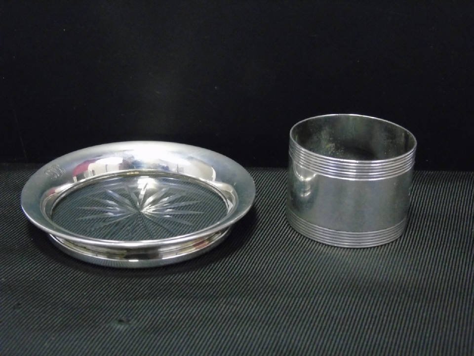 Tiffany & Co Sterling Silver Napkin Ring & Coaster: Tiffany & Company sterling silver napkin ring and coaster. Coaster has crystal bottom. 3 1/4" diameter. Ring is 1 1/4" W. Total silver weight in ounces including crystal is 3.14.