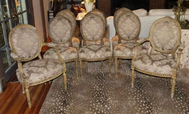 Eight Hand Carved Louis XV Style Dining Chairs: Eight Hand Carved Louis XV Style Dining Chairs. Two armchairs, six side chairs. Hand carved and custom upholstered. Armchairs measure 37 inches in height, 24 inches in width, 20 inches in depth. Side