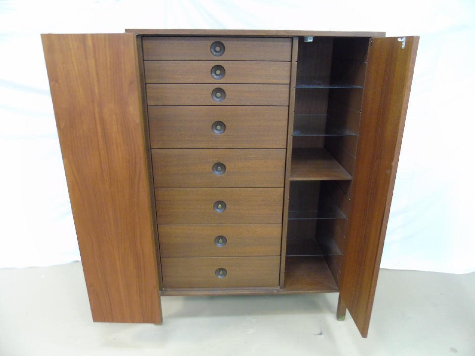 Harvey Probber Mid Century Modern Armoire Chest: Harvey Probber mid century modern armoire / gentleman's chest. Mahogany wood. 8 interiors drawers.(5) 7" deep drawers, (3) 3 1/4" deep drawers. (4) adjustable glass shelves. (1) fixed wood shelf. 38" 